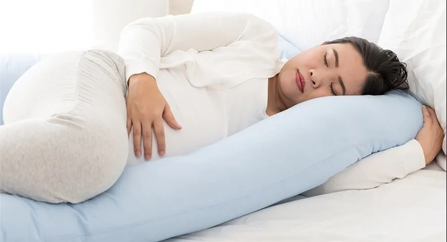 Nằm nghiêng trái khi ngủ được cho rằng giúp tăng lượng dưỡng chất cung cấp đến thai nhi